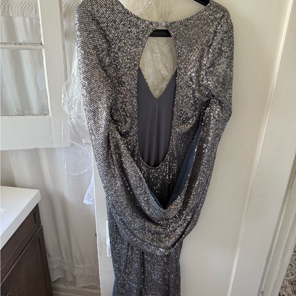Elegant Silver Gown with backless cape